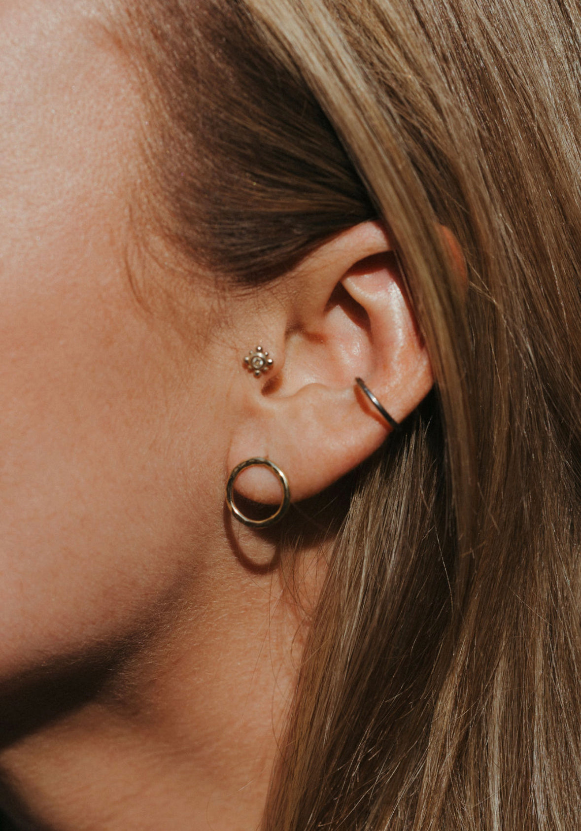  Fusion earrings on ear