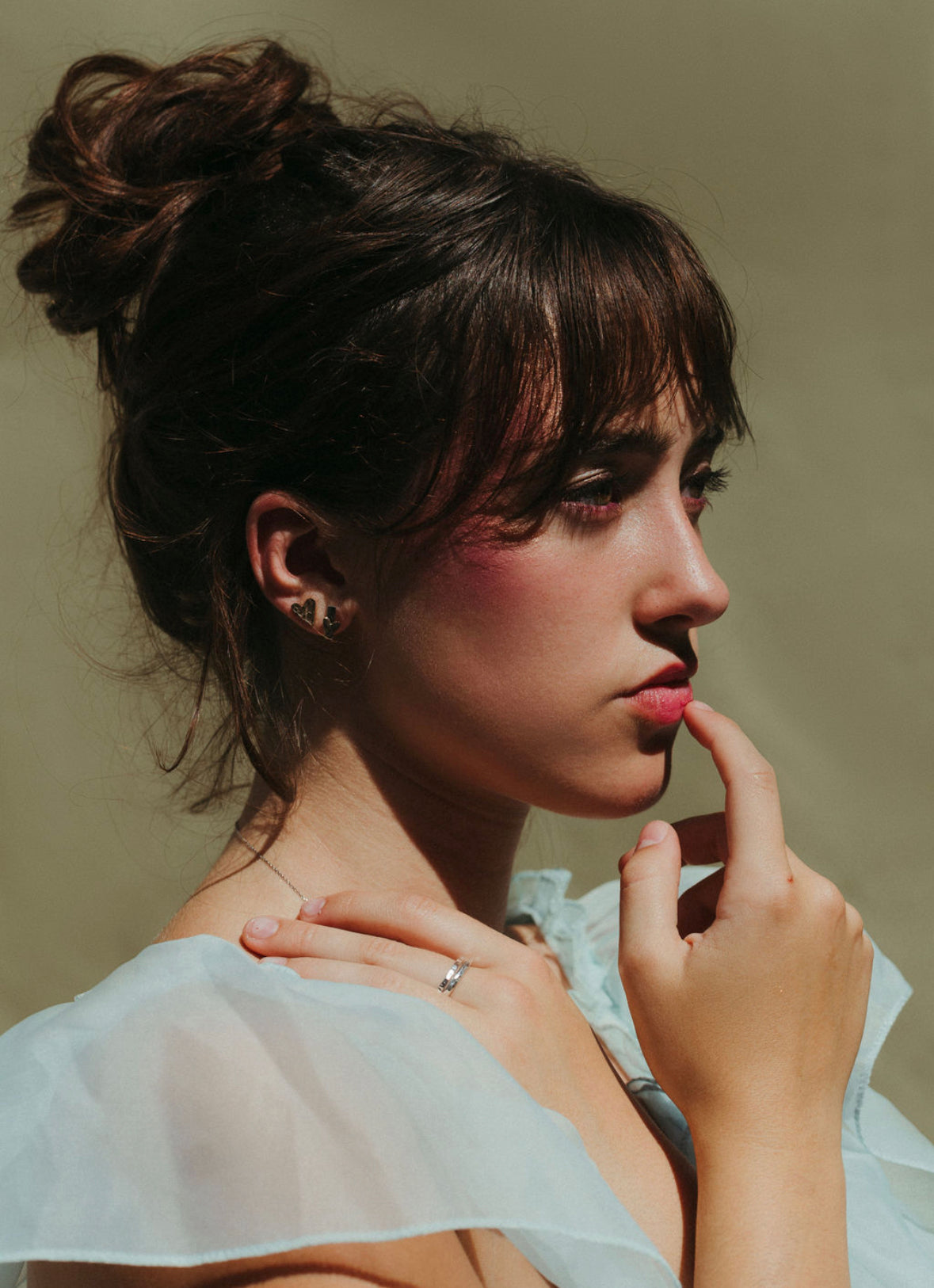 woman wearing bliss earrings