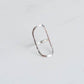 Silver ring with a large oval frame and a hammer finish.