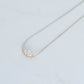 3ct lab grown marquis cut diamond set in a yellow gold basket setting, suspended on silver snake chain. 