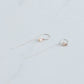 silver threader earrings with a 3mm lab grown round brilliant set in 10K yellow gold bezel settings.